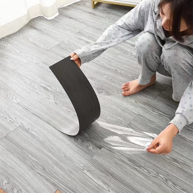 สติกเกอร์พื้นลายไม้  แผ่นติดตกแต่ง PVC แบบติดเอง กันไฟ กันน้ำ กันลื่น กาวแรงมาก ตัดง่าย ติดตั้งที่มุมได้ง่าย